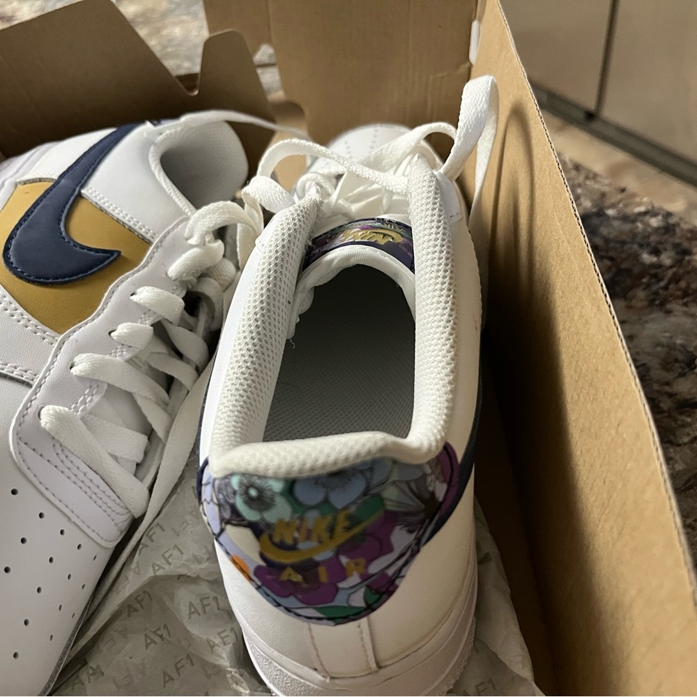 Nike White Sneakers with Navy and Gold Details